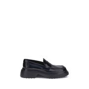 Tod's Black Rubber Platform Loafers